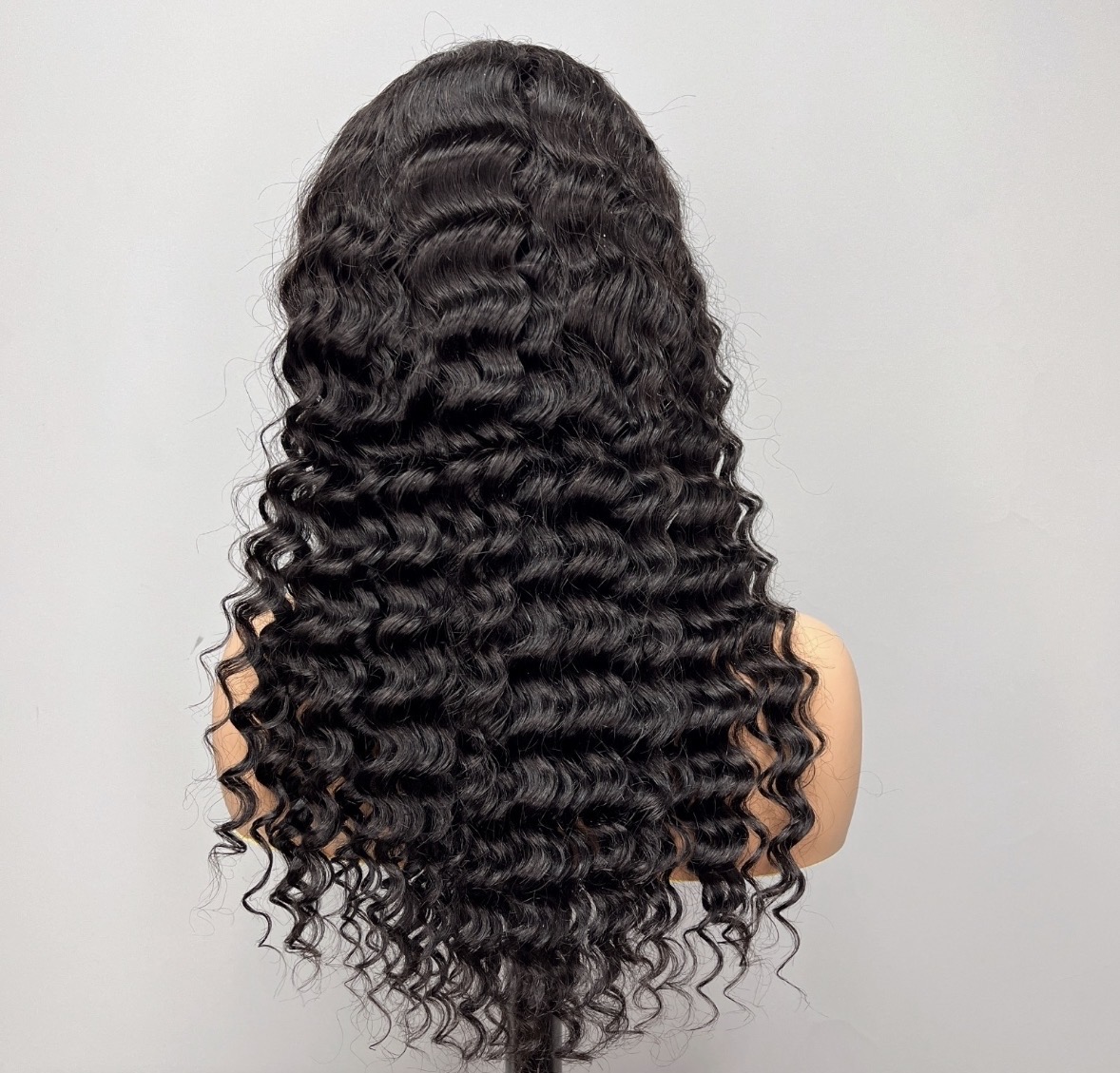 Dark body wave wig on mannequin